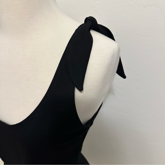 Fun short black knit flirty bow strap day dress. - Picture 4 of 6